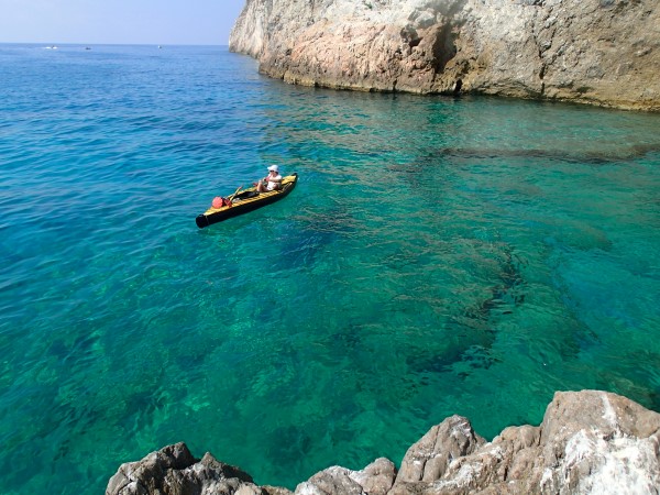 A kayak in the crystal clear waters of the Ligurian Sea